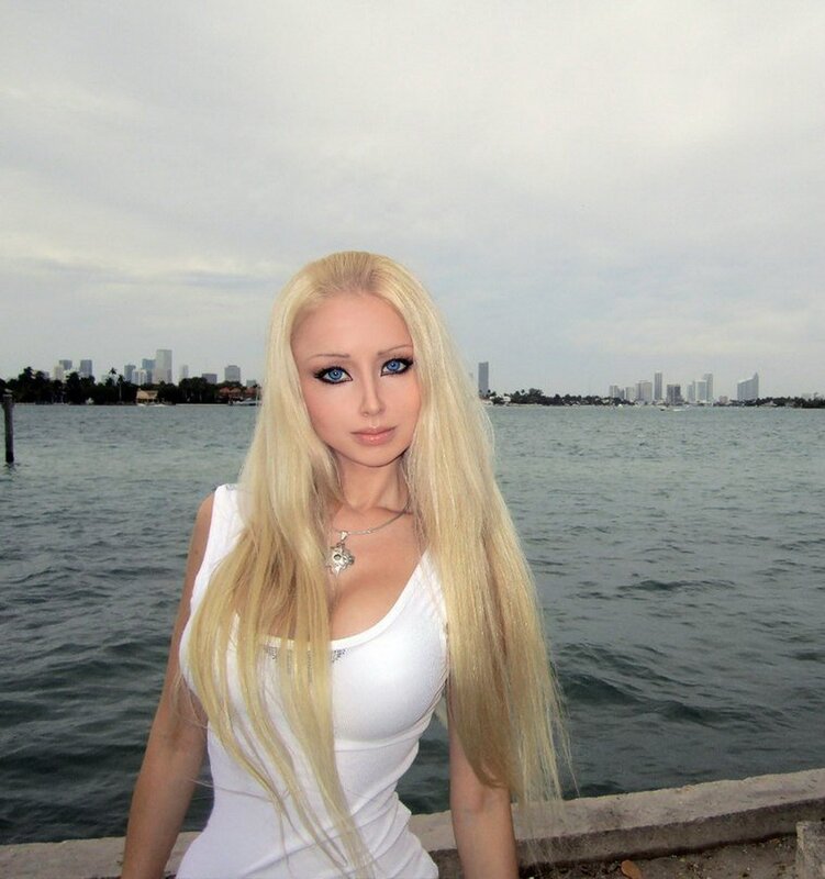 woman with blonde hair by water