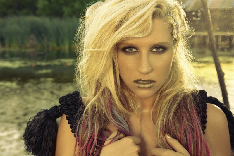 woman with blonde hair by water