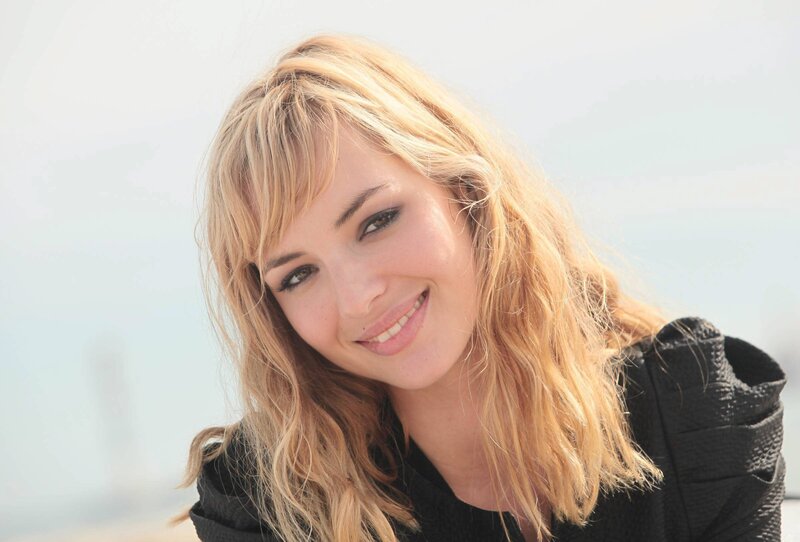 Woman with Blonde Hair — Calm, Afternoon, Photograph, Blonde Hair, Black Top, Smile