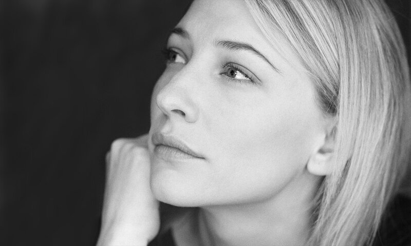 Woman with Blonde Hair — Contemplative, Hand