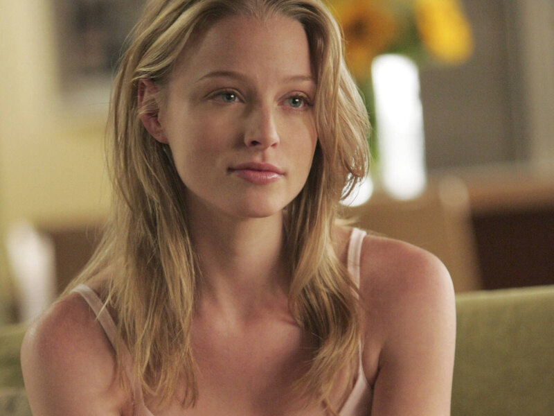 Woman with Blonde Hair — Contemplative