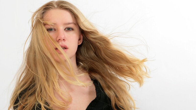 Woman with Blonde Hair — Dynamic, Photograph, Black Top, White Background