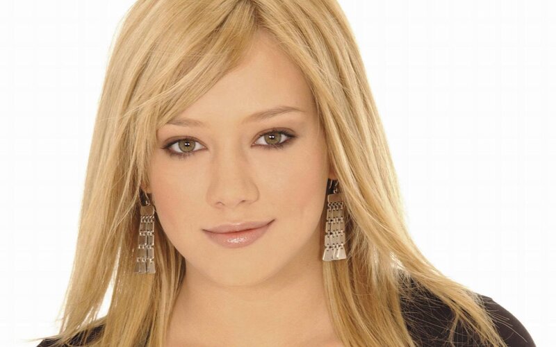 Woman with Blonde Hair — Earrings, Black Top