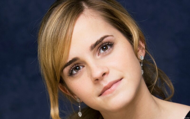 Woman with Blonde Hair — Earrings, Blue Background