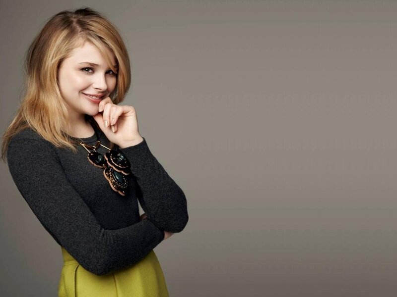 Woman with Blonde Hair — Gray, Friendly