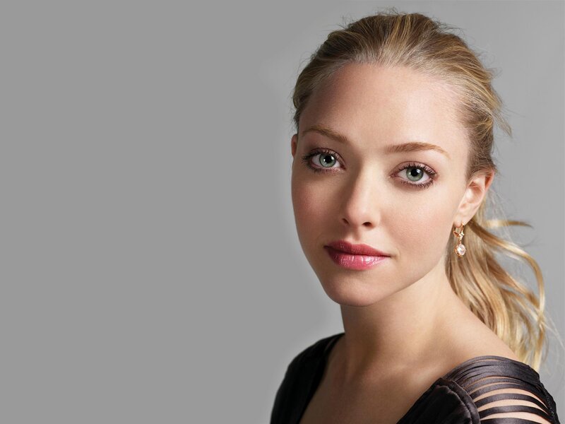 Woman with Blonde Hair — Gray, Neutral, Photograph, Earring, Black Top, Gray Background