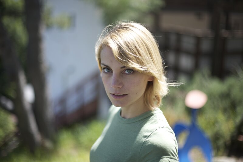 Woman with Blonde Hair — Green, Calm, Afternoon, Photograph, Green Shirt