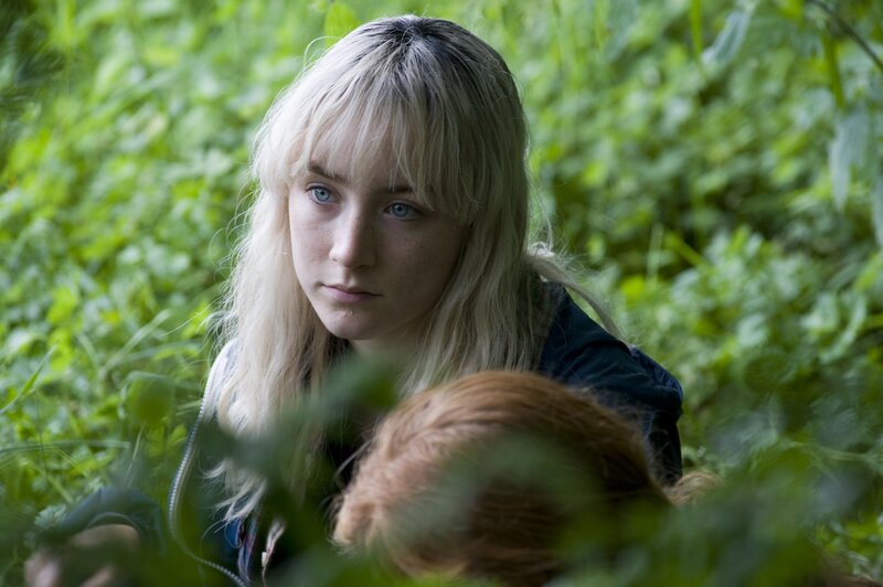 Woman with Blonde Hair — Green, Serious, Photograph, Green Foliage