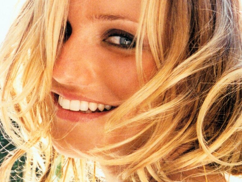 Woman with Blonde Hair — Happy, Brown