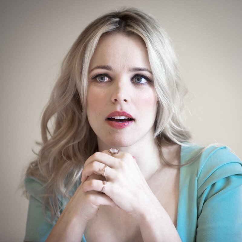 woman with blonde hair in a blue top