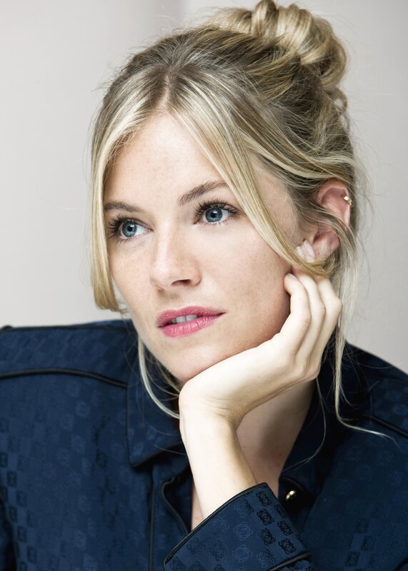 woman with blonde hair in a bun