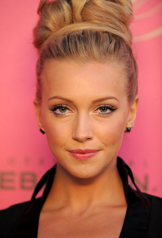 woman with blonde hair in a bun