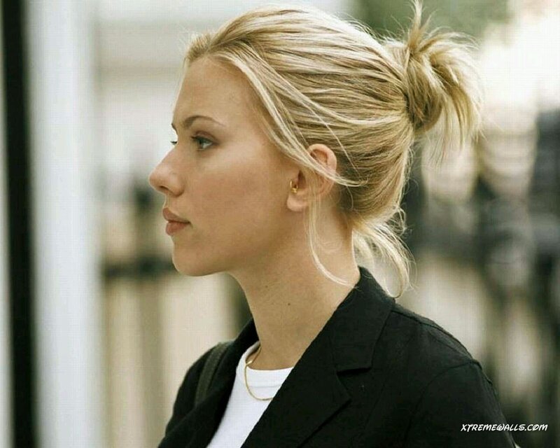 woman with blonde hair in a bun