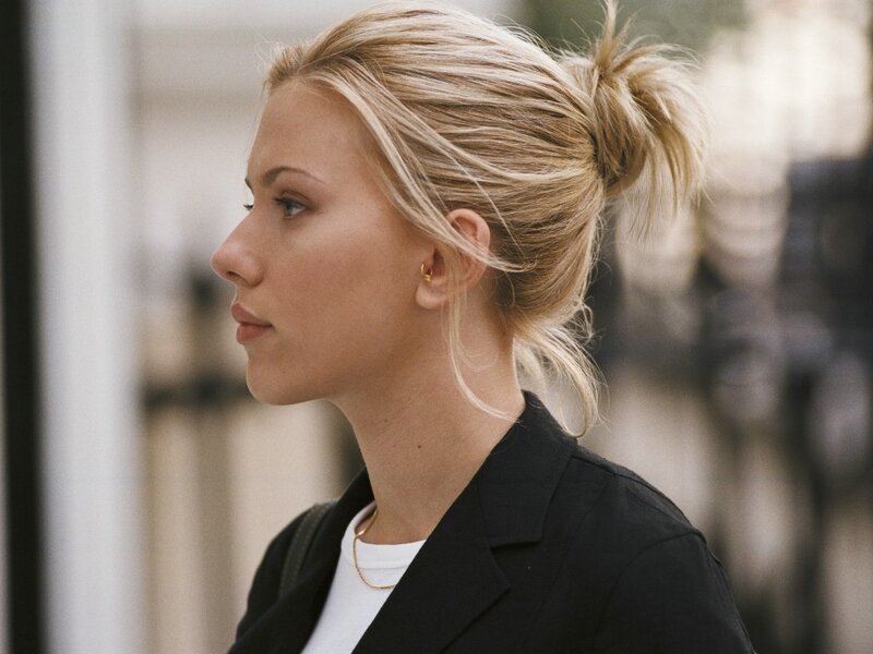 woman with blonde hair in a bun