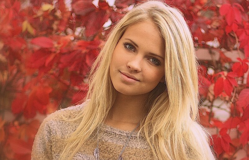 woman with blonde hair in autumn