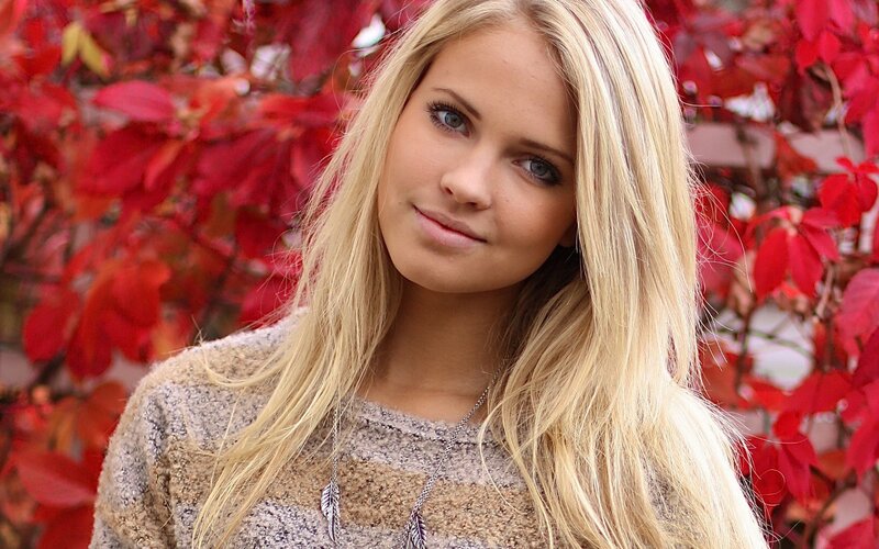 woman with blonde hair in autumn