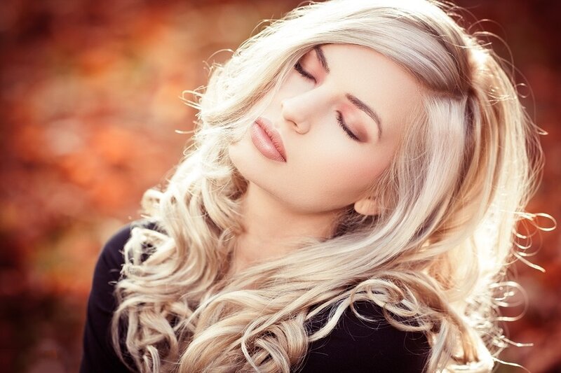 woman with blonde hair in autumn