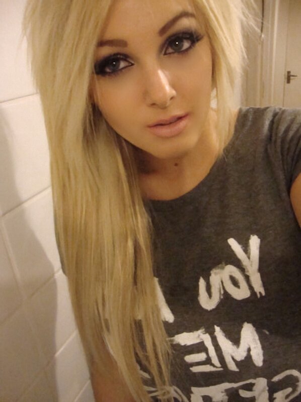 woman with blonde hair in bathroom