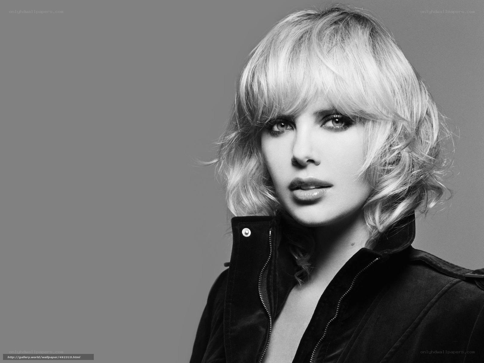 woman with blonde hair in black and white