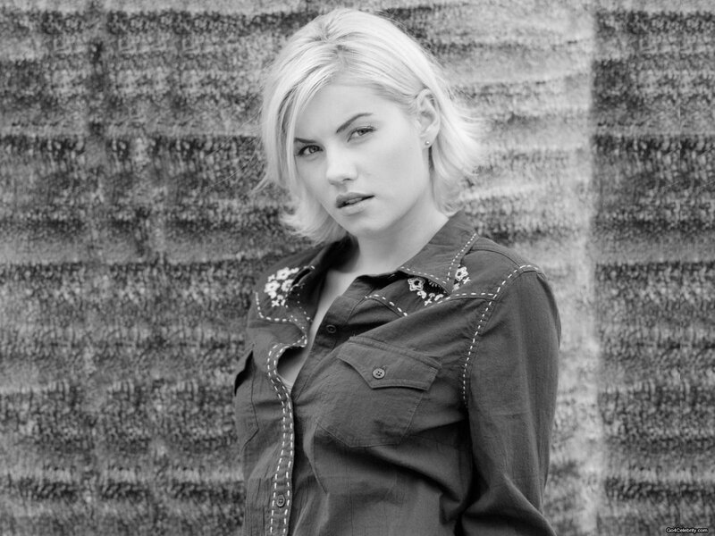 woman with blonde hair in black and white
