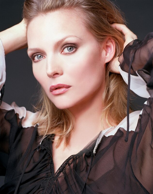 woman with blonde hair in black blouse