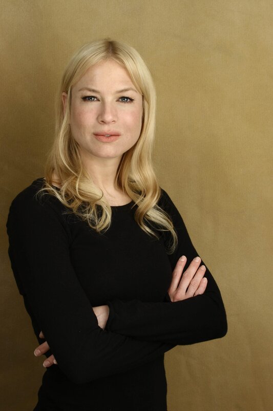 woman with blonde hair in black top