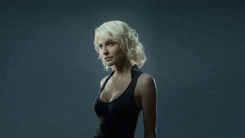 woman with blonde hair in black top
