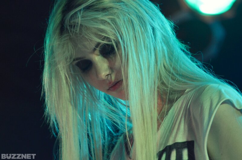 woman with blonde hair in blue light