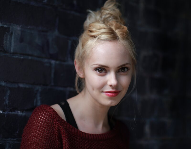 woman with blonde hair in bun