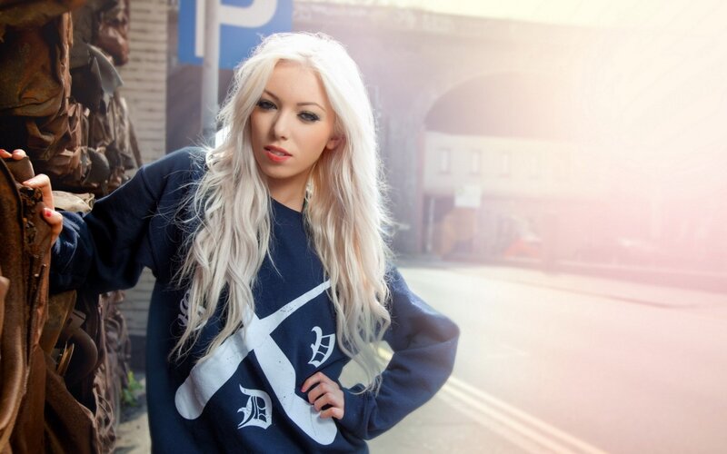 woman with blonde hair in city