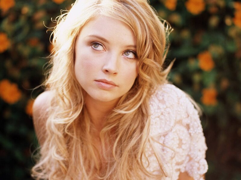 woman with blonde hair in garden
