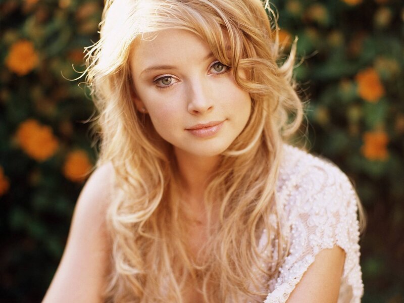 woman with blonde hair in garden