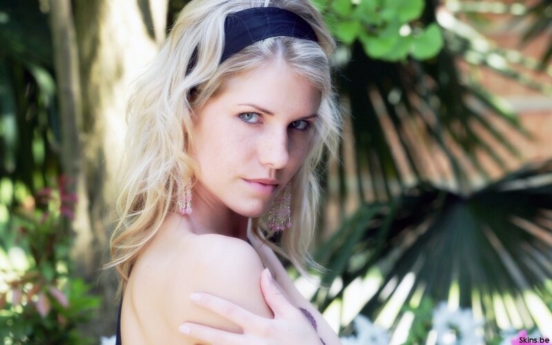woman with blonde hair in garden