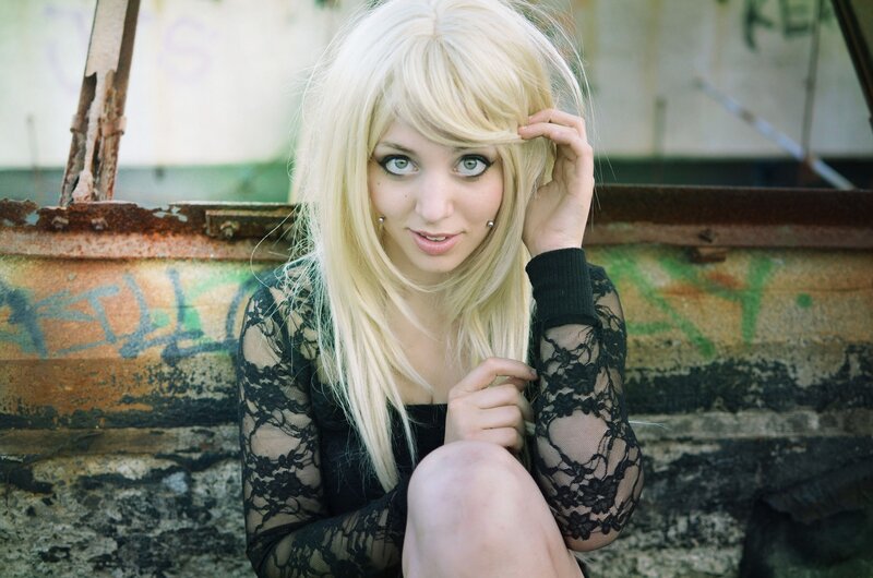woman with blonde hair in lace top