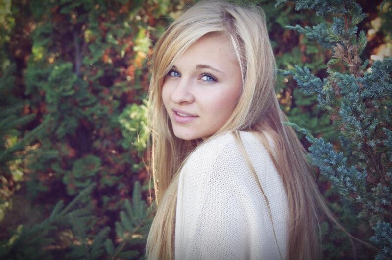 woman with blonde hair in nature