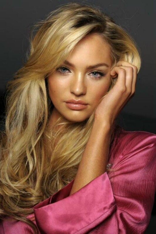 woman with blonde hair in pink top