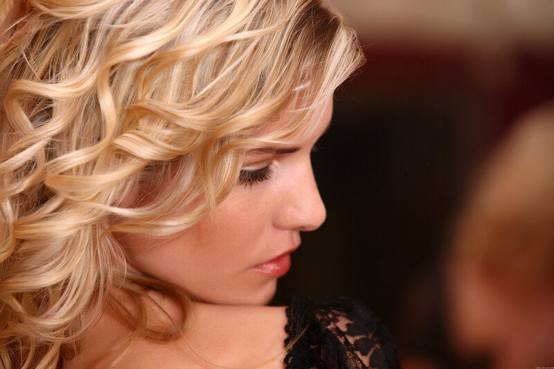 woman with blonde hair in profile