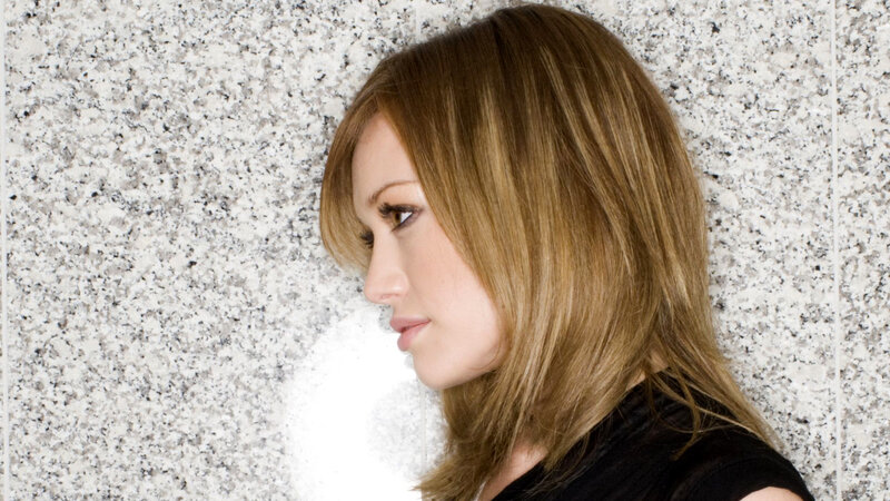 woman with blonde hair in profile
