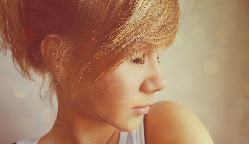 woman with blonde hair in profile