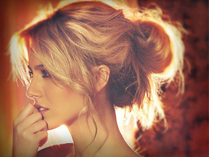 woman with blonde hair in profile