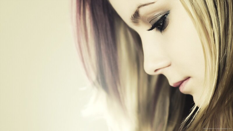 woman with blonde hair in profile