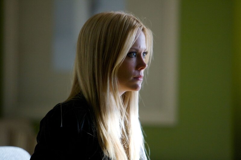 woman with blonde hair in profile