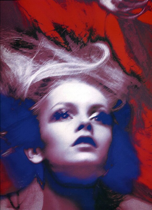 woman with blonde hair in red and blue