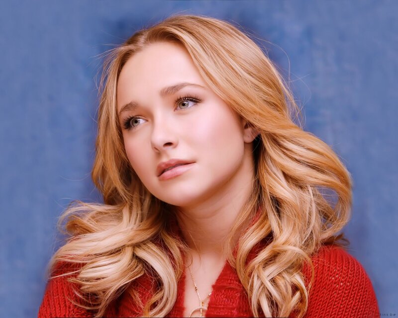 woman with blonde hair in red sweater