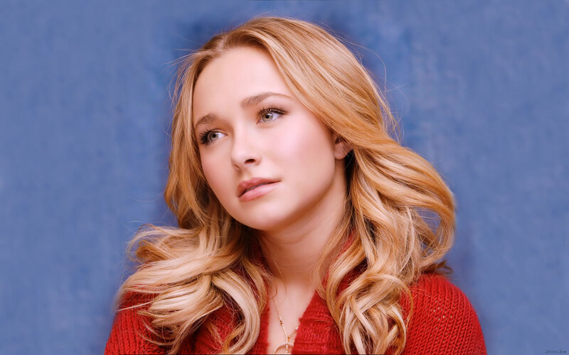 woman with blonde hair in red sweater