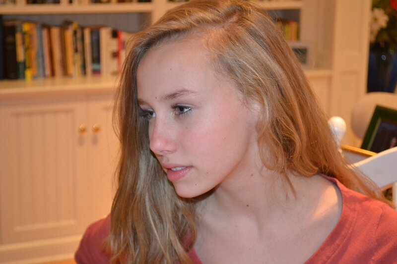 woman with blonde hair in room