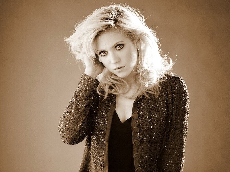 woman with blonde hair in sepia