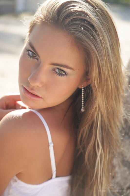 woman with blonde hair in sunlight