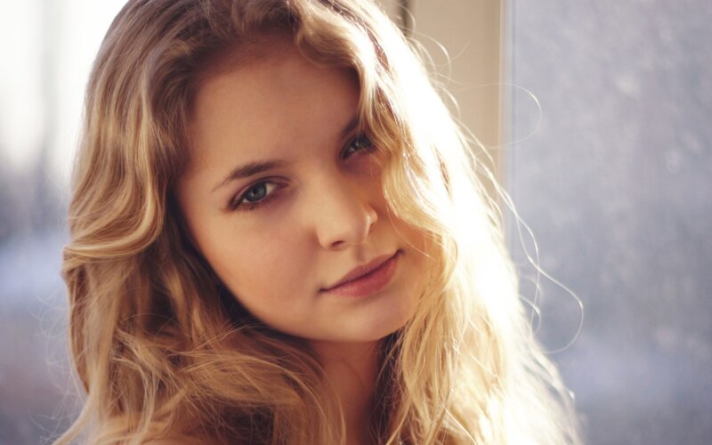 woman with blonde hair in sunlight