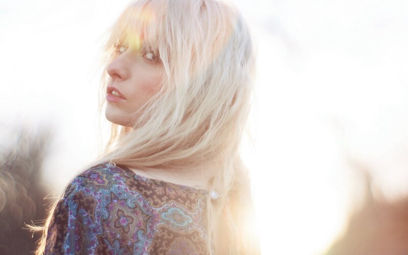 woman with blonde hair in sunlight